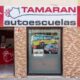 fachada de tamaran con fotos de vehículos- autoescuela tamaran